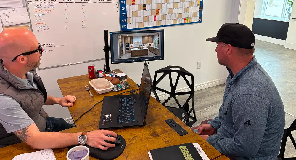 Patrick with a client in the BluePrint Cabinets showroom