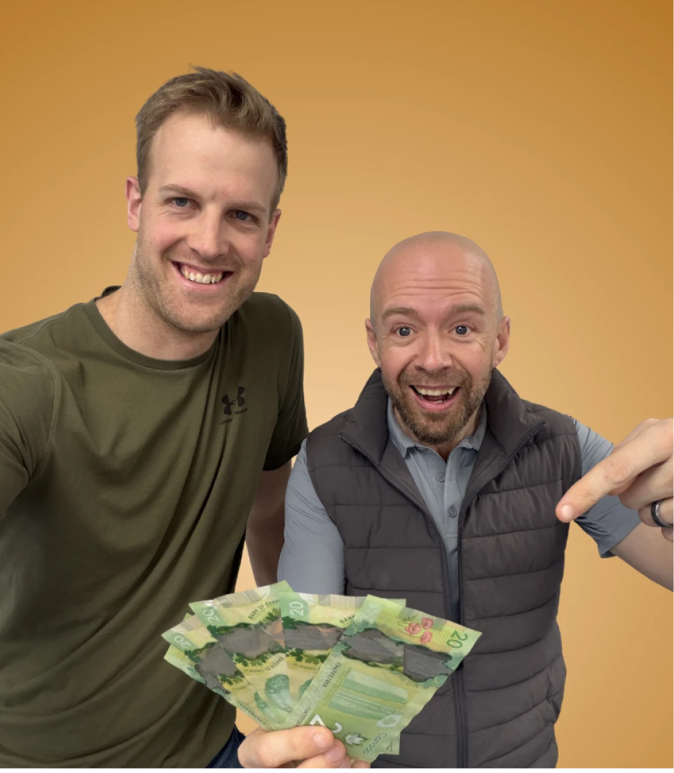 Lewis and Patrick of BluePrint Cabinets holding $200 cash for the referral reward program